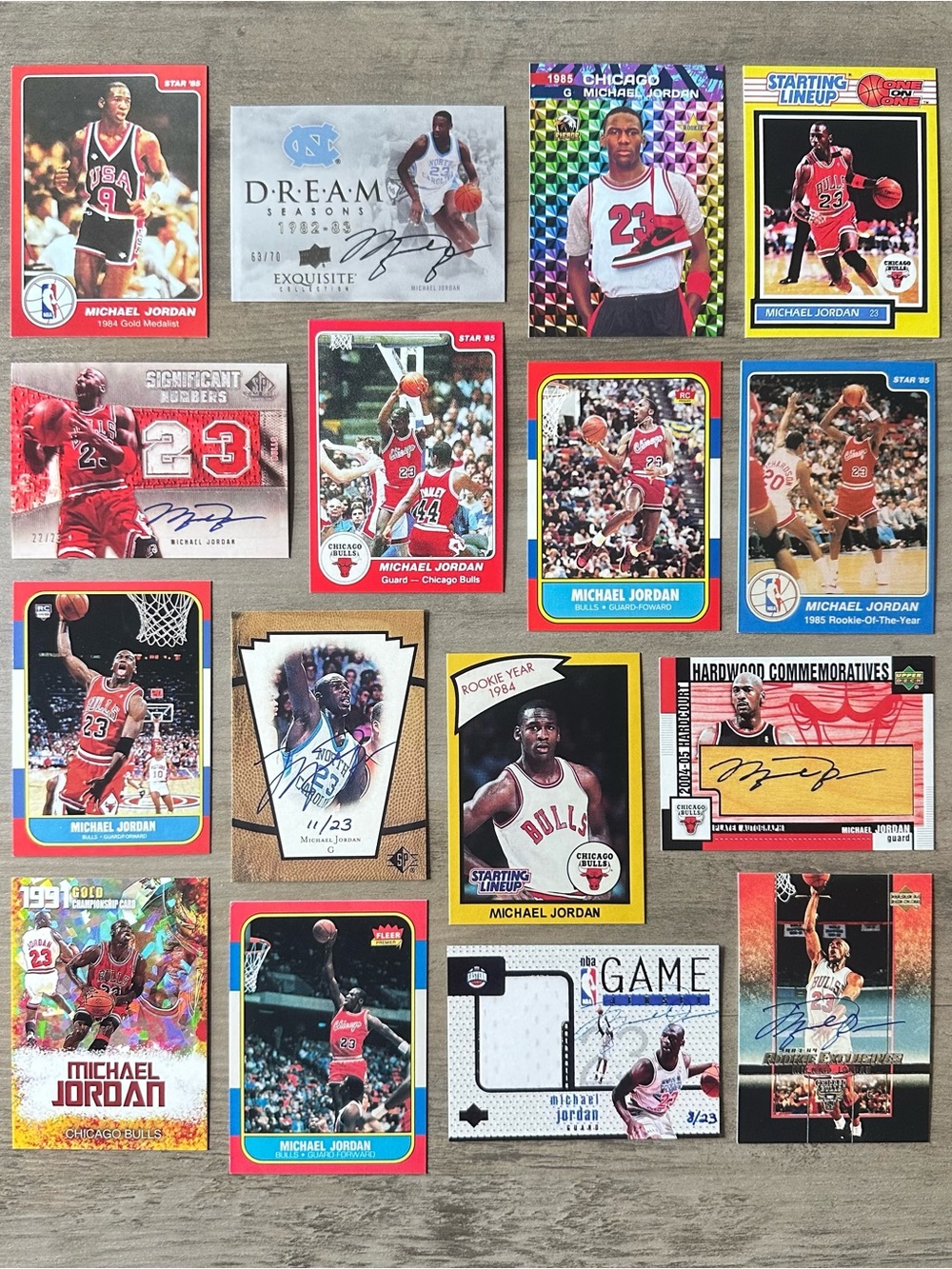 Michael Jordan Signed Rookie Lot of (16) Star UD Starting Lineup Novelty Cards.